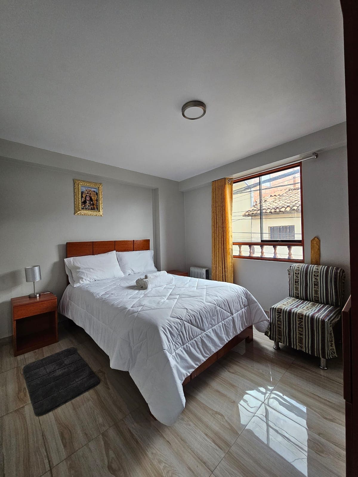 Apartment 2 bedroom with a double bed and seating