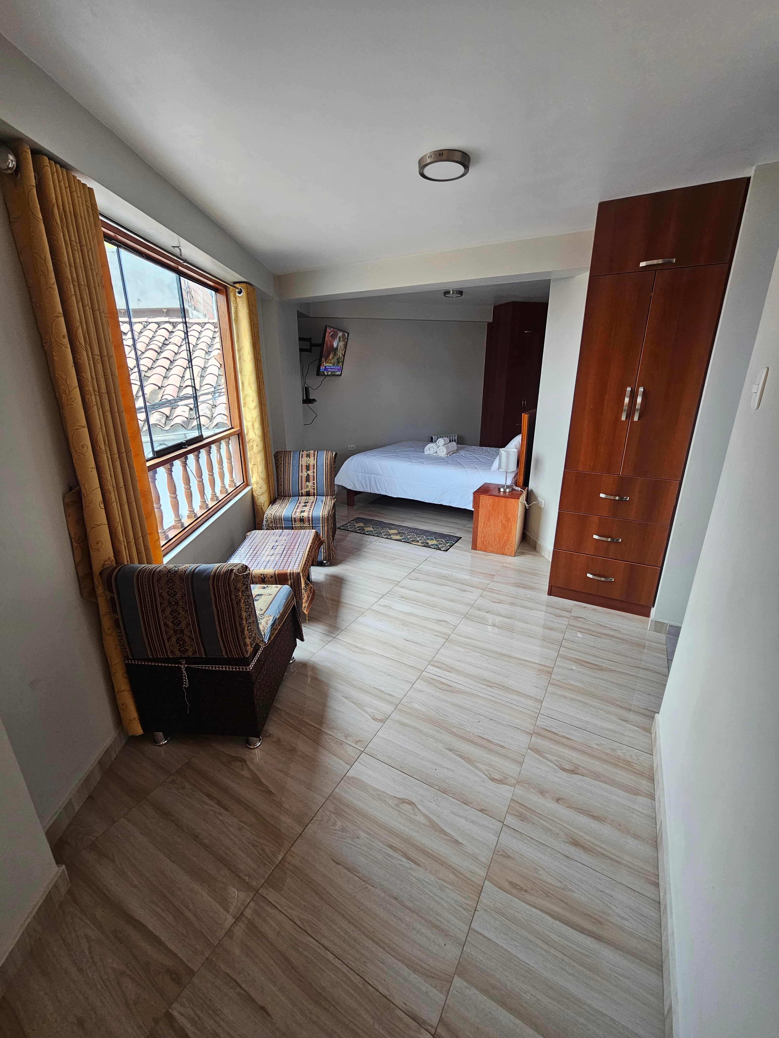 Apartment 5 bedroom and sitting area showing its more spacious layout